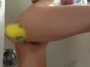 Plays with herself in shower soaking wet