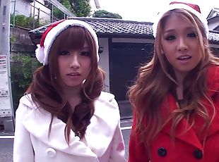 Two depraved Japanese Santa girls ride a shaft by turns in FFM reality