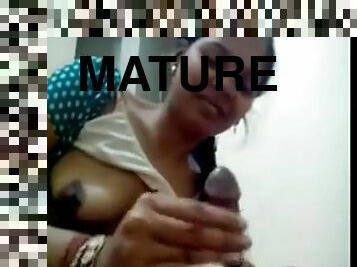 Horny mature indian slut sucks on hard cock