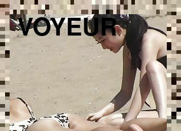 Cute teen girls have fun on the beach voyeur video