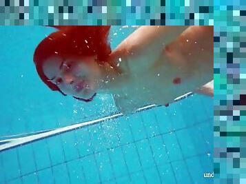 Underwater erotica stars a sexy swimming girl