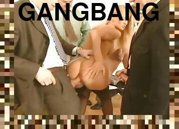 Gorgeous blonde girl in an amazing gangbang video