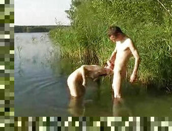 Young couple fucks in the lake