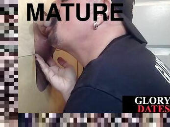 Gloryhole mature sucking and masturbating with a rod until she cums in her mouth