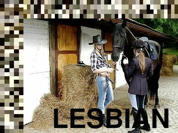 Two beautiful chicks play lesbian games on the stable