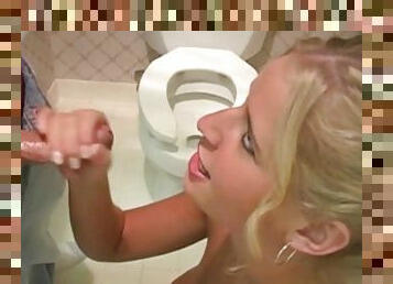 Madison James gives great handjob in toilet and gets cum on her tits
