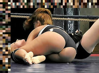 Hot women wrestle in the ring
