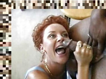 Hot redhead sucks his big black cock