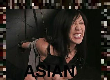 Tia Ling enjoys a toy in her Asian pussy in terrific BDSM clip