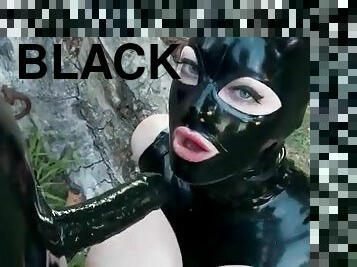 Cock wrapped in black latex sucked