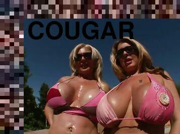 Two stunning cougars with huge boobs having a pretty nice threesome