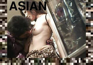 Asian cowgirl blows her new stud in the changing booth at the mall