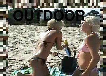 Three blonde girls toy pussies after resting on a beach
