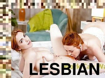 Two sexy lesbian redheads lick each other to intense orgasms