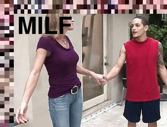 A MILF meets a younger guy in the workout room and rides his shaft