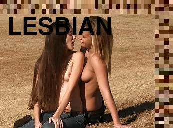 Cute lesbians make out and expose their tits for the camera