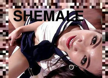 Shemale in a short skirt reveals each part of her adrenalizing body