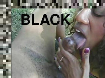 Torri Flames sucks a black dick outdoors and gets facialed