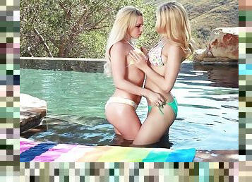 It's poolside lesbian fun as these two hook up and play
