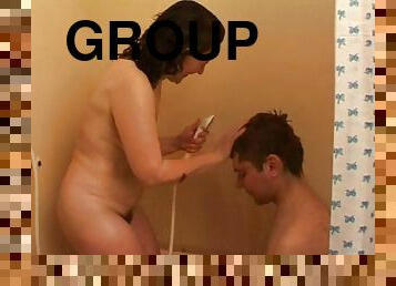 She takes a shower then has group sex with several guys
