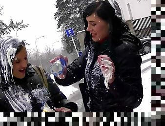 Hot girls go outside and play around in the cold snow