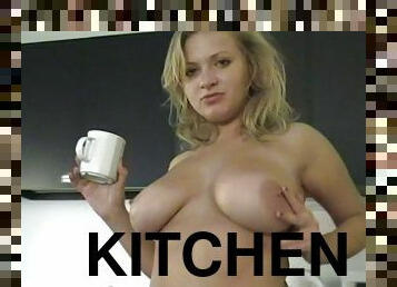 Morning coffee inspires the girl to do a sexy striptease