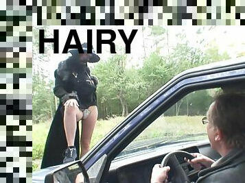 Babe with a hairy cunt picked up and fucked in the car by an old guy