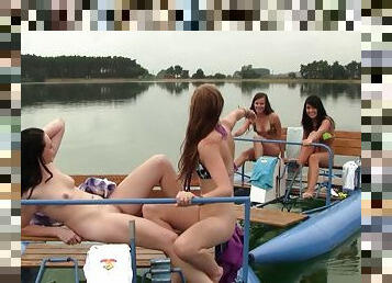 Four lesbians get involved in a steamy twat teasing and licking outdoors