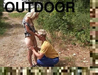 Teen in a tiny dress gets fucked by a blonde guy outdoors