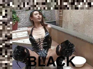 Black latex is breathtkaing on a cute solo Japanese tranny