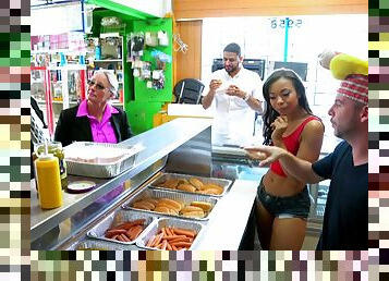 Cute girls sucking dick and fucking at a hot dog joint