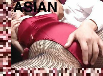 An Asian girl in Playboy bunny costume gets fucked on a couch