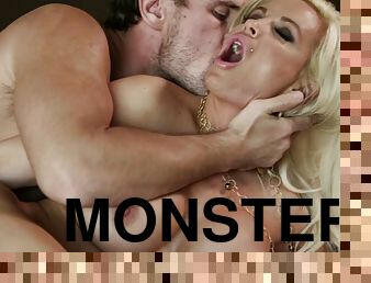 A blonde with monster fake tits gets drilled and cums on his cock