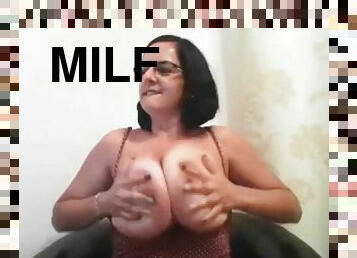 Milf with glasses shows her big boobs