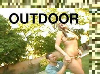 Hot Daryn Darby poses in a bikini and rides a dick outdoors