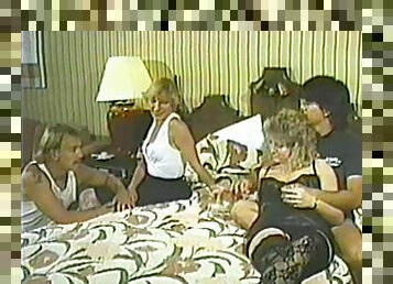 Retro video with kinky two swinger couples fucking in a bedroom