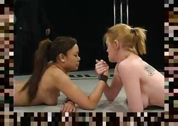 Annie Cruz gets toyed hard by busty Darling in a ring