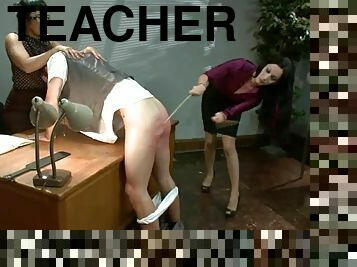 Two nasty teachers whip and toy a guy with a strap-on