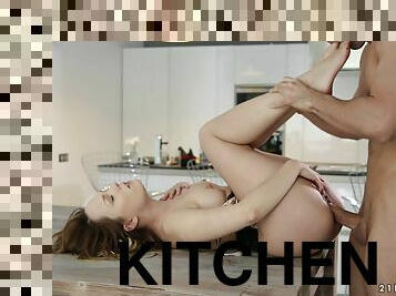 Cute blonde gives a footjob and gets banged in the kitchen