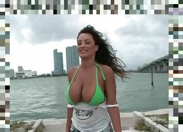 Busty sex queen in bikini flashing her hot ass outdoor