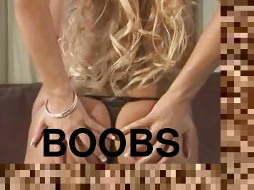 Curvy blonde Lisa Lacey demonstrates her big boobs