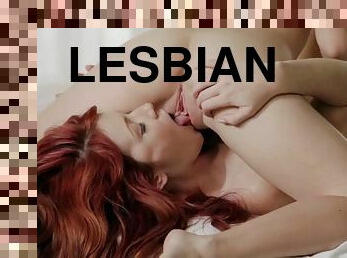 Blonde and redhead beauties in hot lesbian sex video