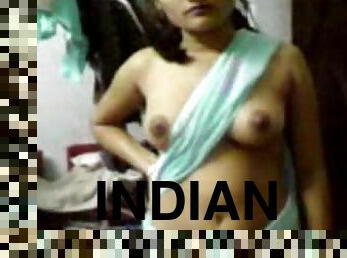 Naughty Indian chick poses naked and gets fingered