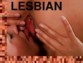 Isabella and Eva use a dildo while making lesbian love indoors