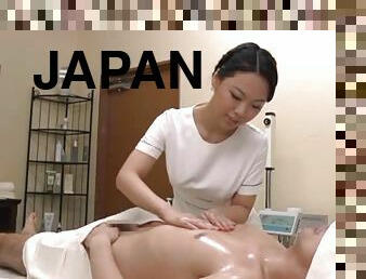 Hot Japanese masseuse gives great handjob to a guy