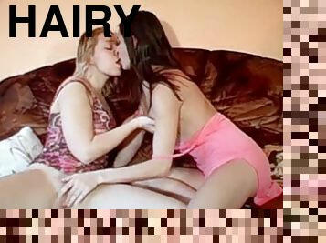 Two sexy babes are making out on each other's hairy twats