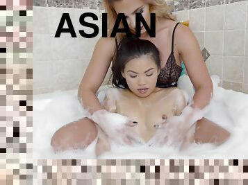 Asian lass going totally lesbian with her mentor in the bathroom