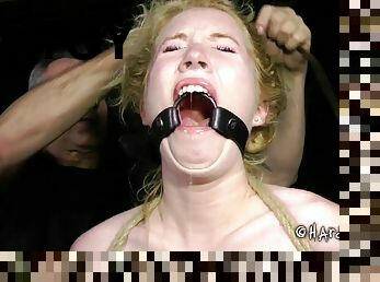 Tied bondage blonde screams when screwed with toy in BDSM