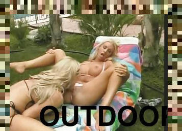 Bimbo bitches in bikinis eat pussy and nips outdoors