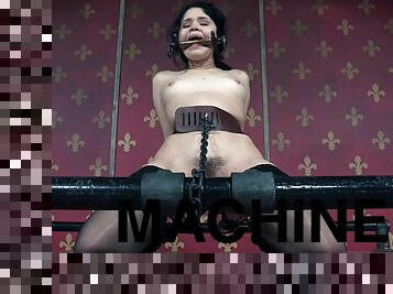 Widened legs slave screwed using machine in BDSM shoot